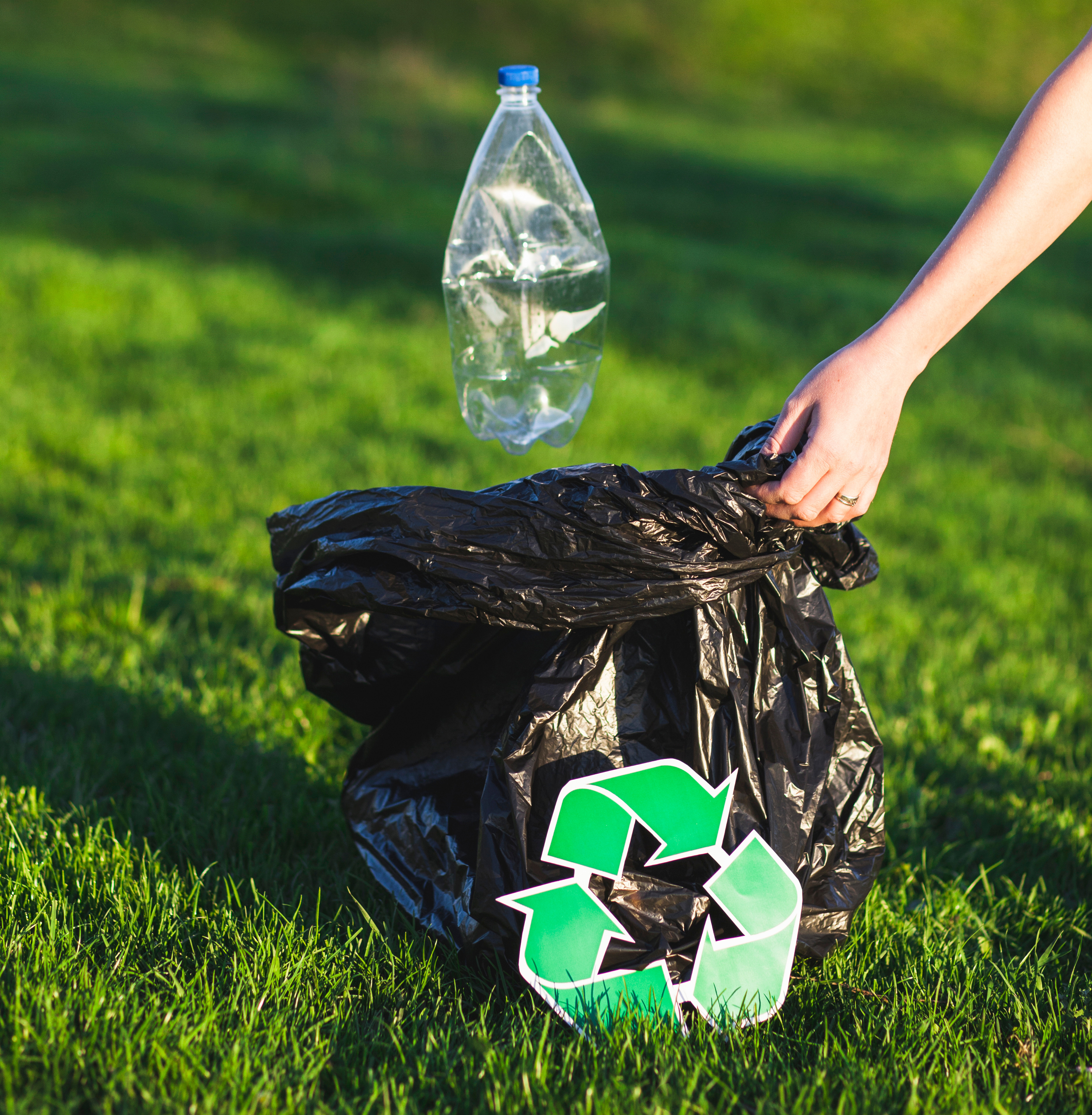 recycle-concept-with-woman-collecting-trash